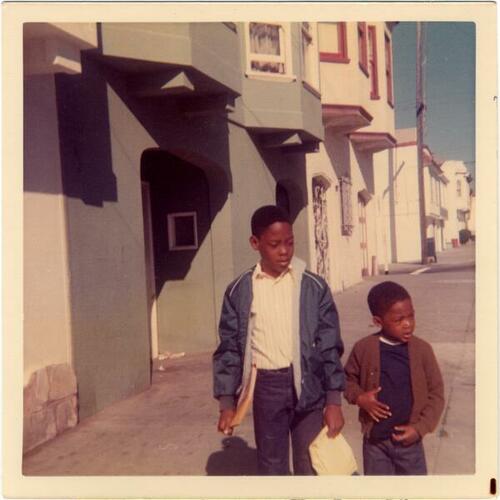 [Vincent and Russell in front of residence on Quesada]