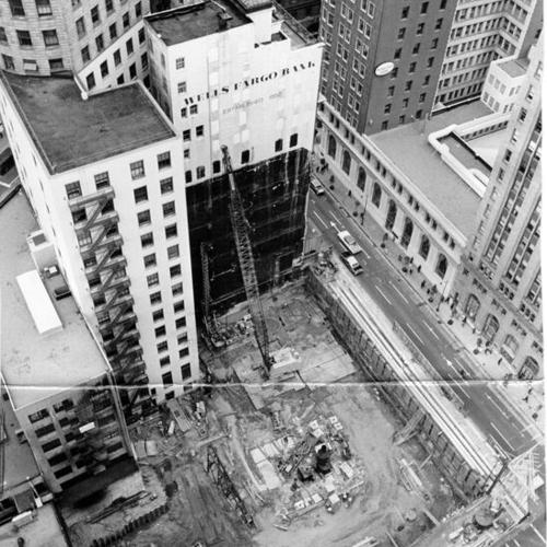 [Aerial view of construction site of a 43-story Wells Fargo Bank building at Sutter and Montgomery streets]