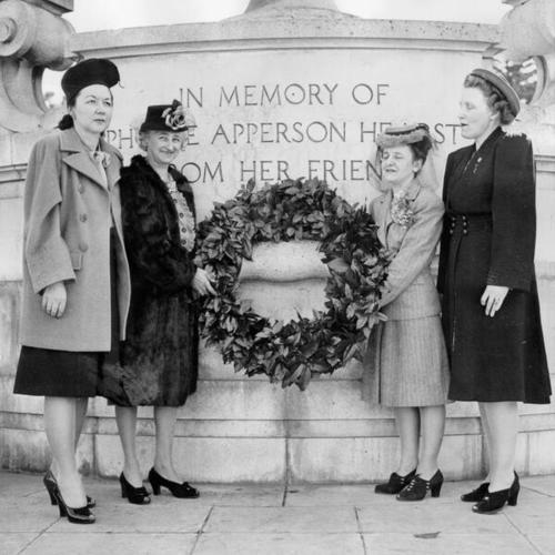 [Mrs. George H. Bowman, Mrs. Frank J. Weiman, Mrs. H. W. Thomas and Mrs. C. W. Corson placing a wreath on the monument to Phoebe Apperson Hearst in Golden Gate Park]