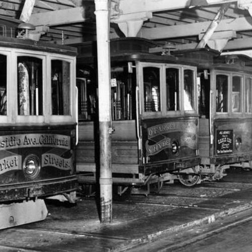 [Cable cars inside the cable car barn at California and Hyde streets]