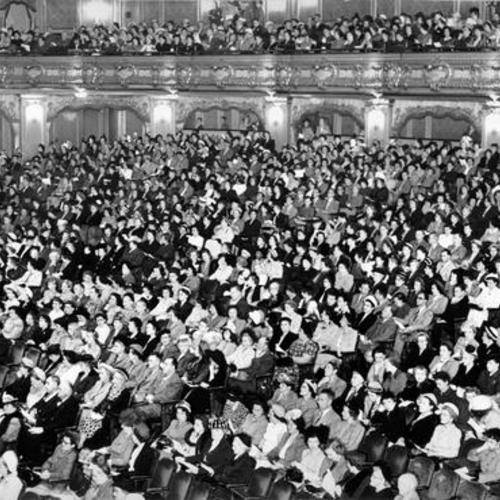 [Crowd of San Francisco teachers gather at the Fox Theater for a meeting]