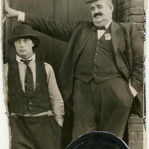 Buster Keaton with Joe Roberts in silent film "Cops"