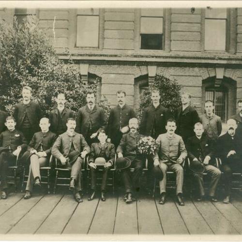 [Group of men from the County clerks office posing for a photograph]