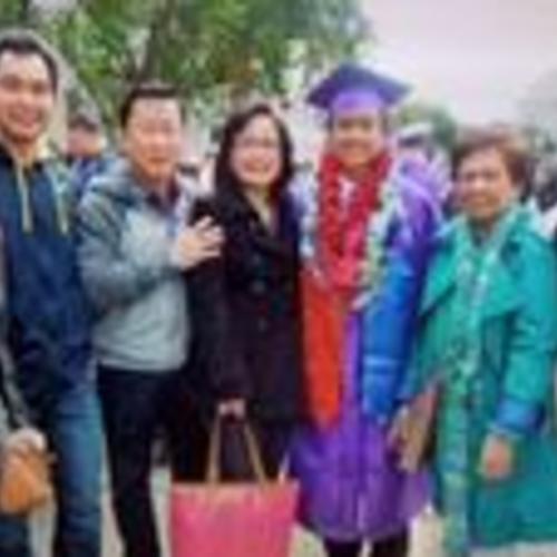 [Jerold with his family at his graduation]