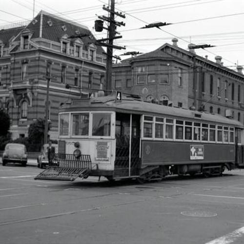 [Sixth avenue and Geary boulevard looking southeast at inbound #4 line car 665 in front of French Hospital]