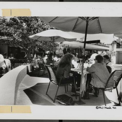 Miss Pearl's Jam House poolside patio dining at 601 Eddy Street