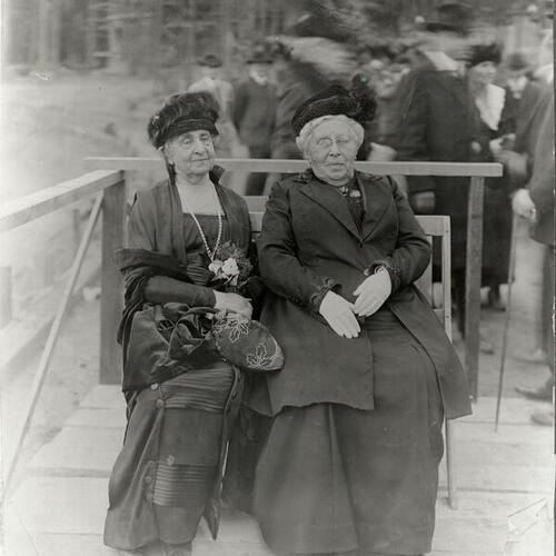 [Two seated ladies]