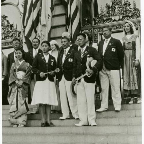 [Japanese Olympic group in front of City Hall holding key of San Francisco]