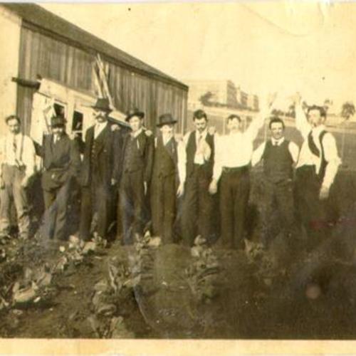 [Unidentified group of men posing for a picture in Visitacion Valley]