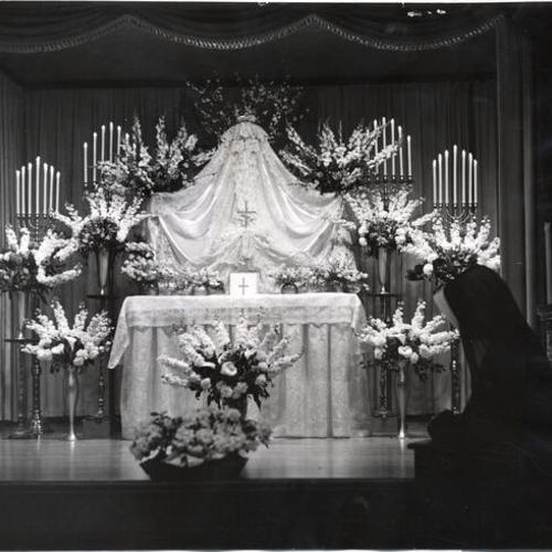 [Shot of the decorated altar at the college studio of San Francisco College for Women]