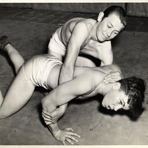 [Ray Dole (top) and Bob Hanick demonstrating wrestling as part of the National Boys' Club Week]