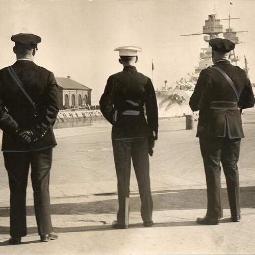[Two police officers and a marine guarding the U. S. S. Pennsylvania at a Hunters Point dry dock]