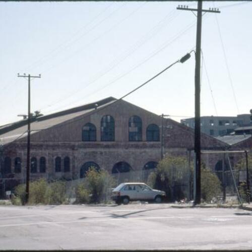[20th Street at Illinois, looking east at shipyard buildings]