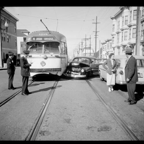 [Scene of an automobile collision with N Judah streetcar on Irving Street near 11th Avenue]