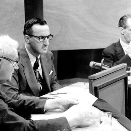 [Harry Bridges and Roger Lapham during a televised debate moderated by Roger Boas]