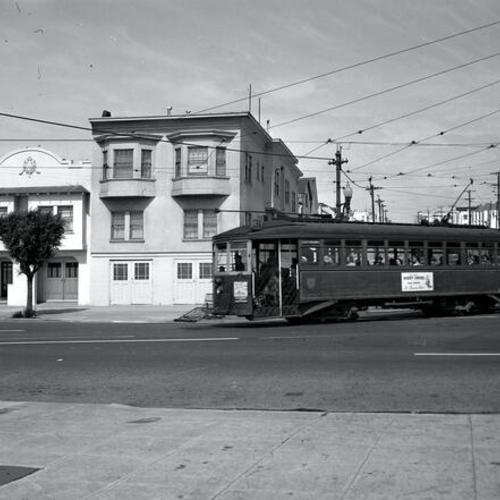 [Turk street and Arguello boulevard looking east at outbound #31 line car 981 heading toward Balboa street]