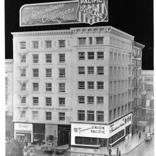 [View of building on corner of Geary Street and Powell showing artists rendering of new Union Pacific Railroad offices]