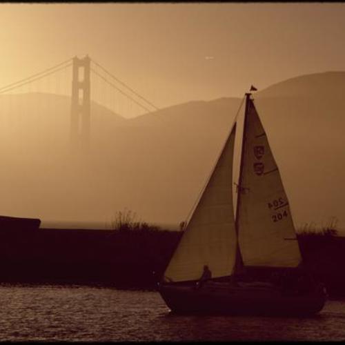 Sailboat on the water with Golden Gate Bridge in the background