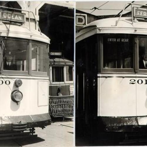 [Two Municipal Railway streetcars]