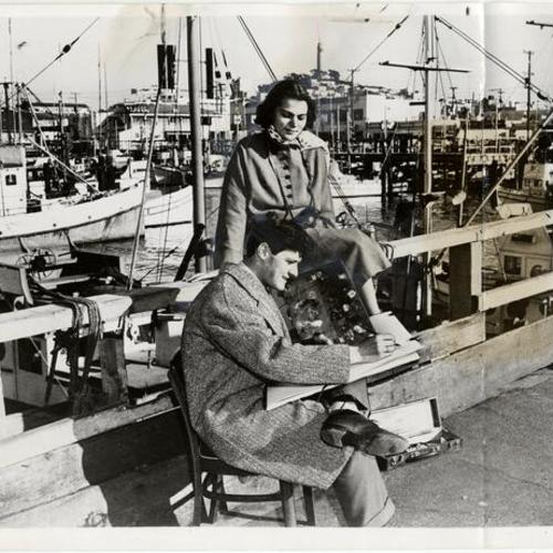 [Fred Troller and wife Beatrice sitting in one of the most scenic spots in the Fisherman's Wharf]