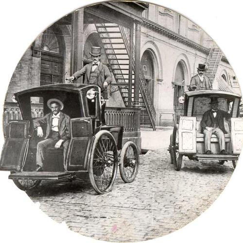 [Two early taxicabs]