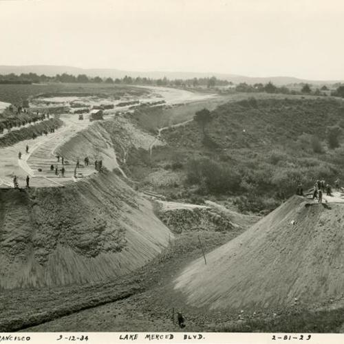 [Construction of a road around Lake Merced]