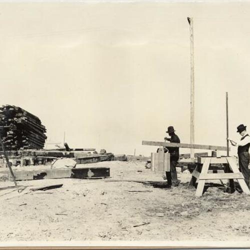 [Surveyors at construction site of Panama-Pacific International Exposition]