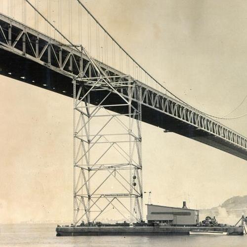 [Scene of an accident in which a giant crane, atop a barge, slammed against the lower deck of the San Francisco-Oakland Bay Bridge]