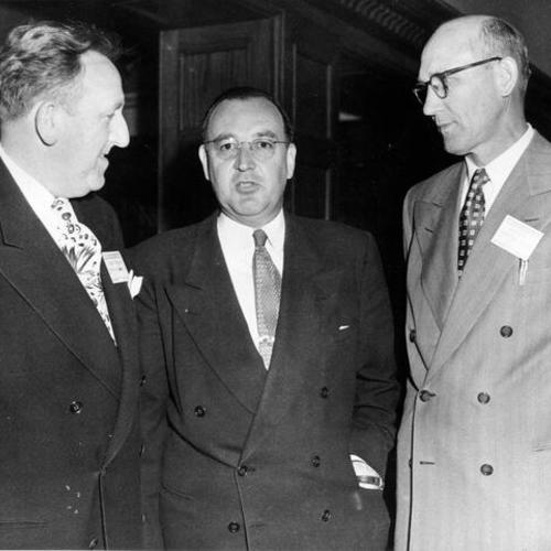 [Edmund G. "Pat" Brown (center) with two unidentified men]