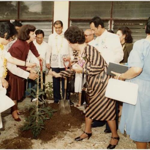 [Dianne Feinstein planting a tree in dedication of Manila San Francisco-Friendship Library.]