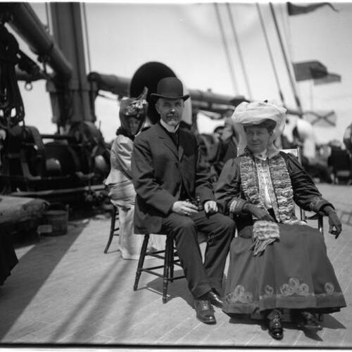 Mr. and Mrs. Dundas sitting on ship