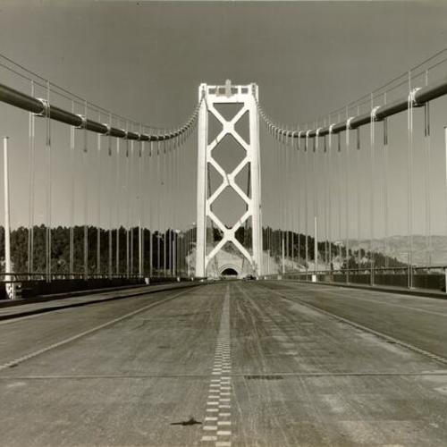 [View of  the San Francisco-Oakland Bay Bridge, looking toward Oakland from one of the traffic lanes on the San Francisco side of the bridge]