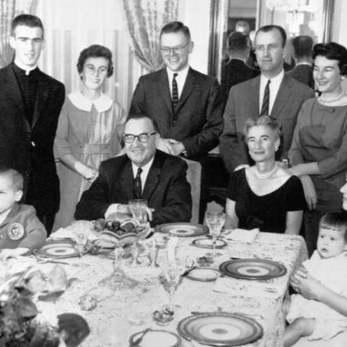 [Governor Brown and his family at dinner table in the Executive Mansion]