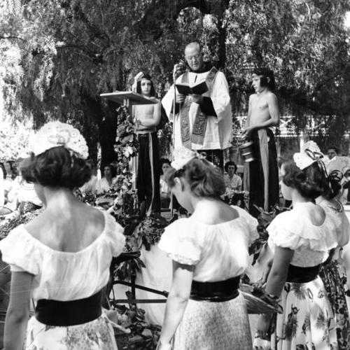  traditional blessing of the grapes ceremony in Sonoma Plaza by Father Alfred Boeddeker of St. Boniface Church, San Francisco]