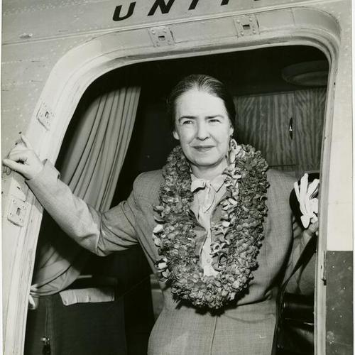 [Dr. Grace Morley arrives in Hawaii to judge an art show]