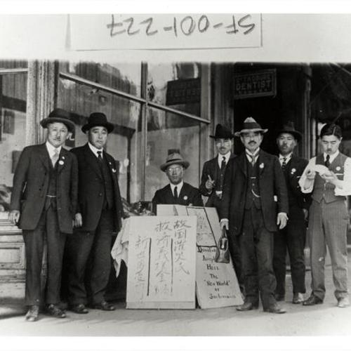 [Group of men standing in front of a store in Japantown]