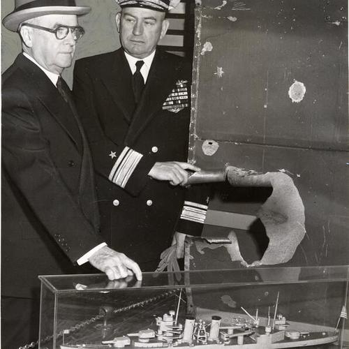 [Rear Admiral Betram J. Rodgers who is acting as host to Secretary of Navy Francis P. Matthews during his visit, shows his distinguished guest the soon-to-be-opened Marine Museum at Aquatic Park]
