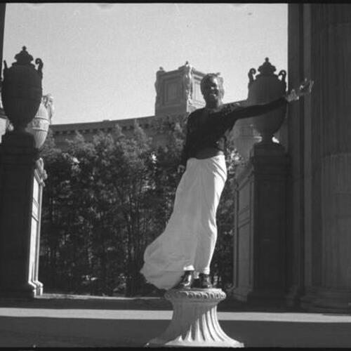 Sylvester standing on column at Palace of Fine Arts