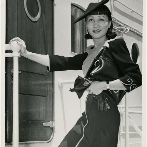 Anna May Wong in hat on ocean liner