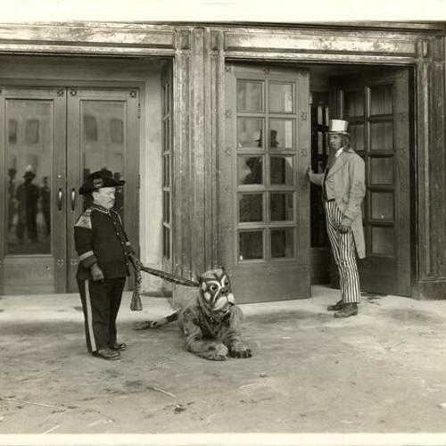 [Actors from Toyland exhibit at the Panama-Pacific International Exposition posing in front of Civic Auditorium]