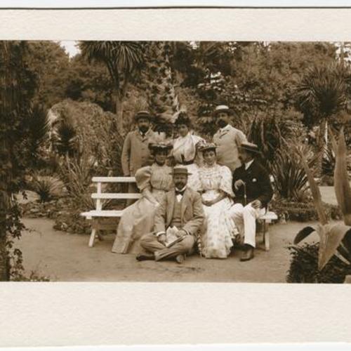 [Unidentified group of people on a bench in Golden Gate Park]
