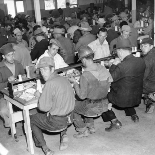 [Workers dining in a cafeteria at Hunters Point Drydock]