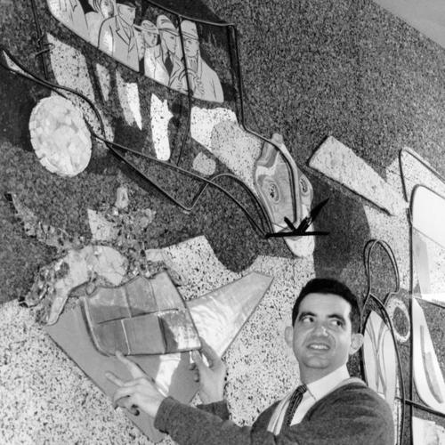 [Saunders Schultz working on "Gas Buggy" mural at the Jack Tar Hotel]