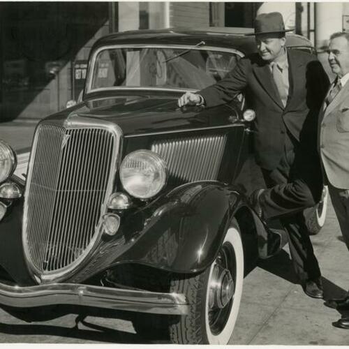 William L. Hughson and Ty Cobb with Ford automobile