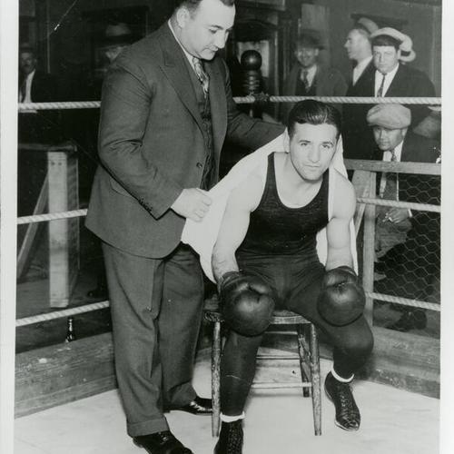 [Boxer Young Corbett III inside the boxing ring with his manager Ralph Manfredo]