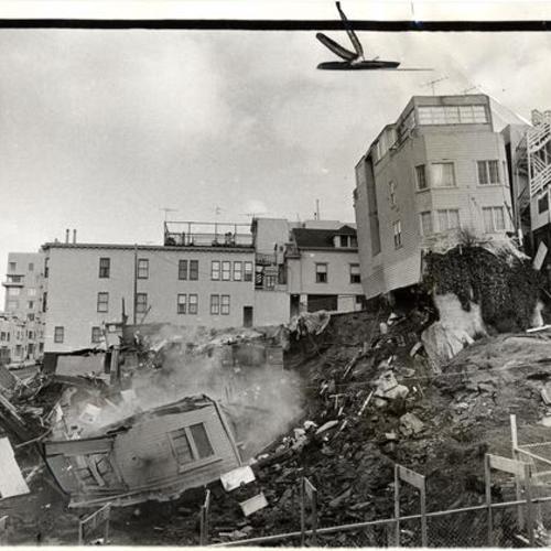 [Building collapsing down hillside on Child Street on the western slope of Telegraph Hill]