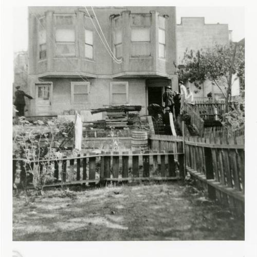 [Norwich Street residence and front yard with fence]