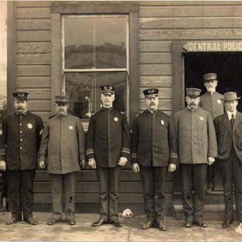 [Group of police officers posing in front of Central Police Station]