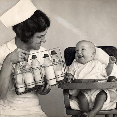[Community Chest nurse with baby]