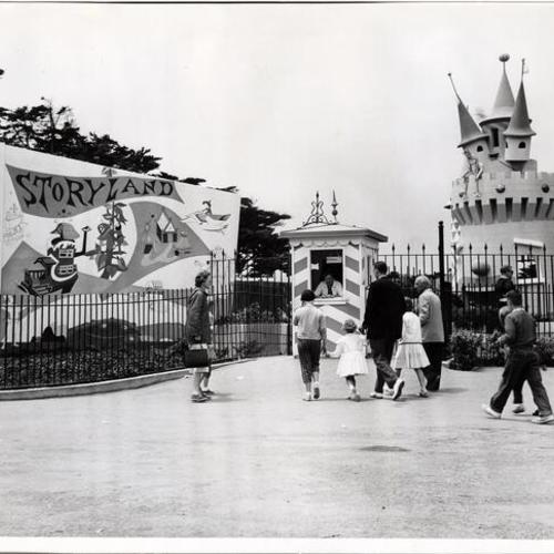 [Kids and adults entering Storyland at the Fleishhacker Zoo]